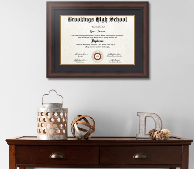 A framed certificate is displayed on the wall.